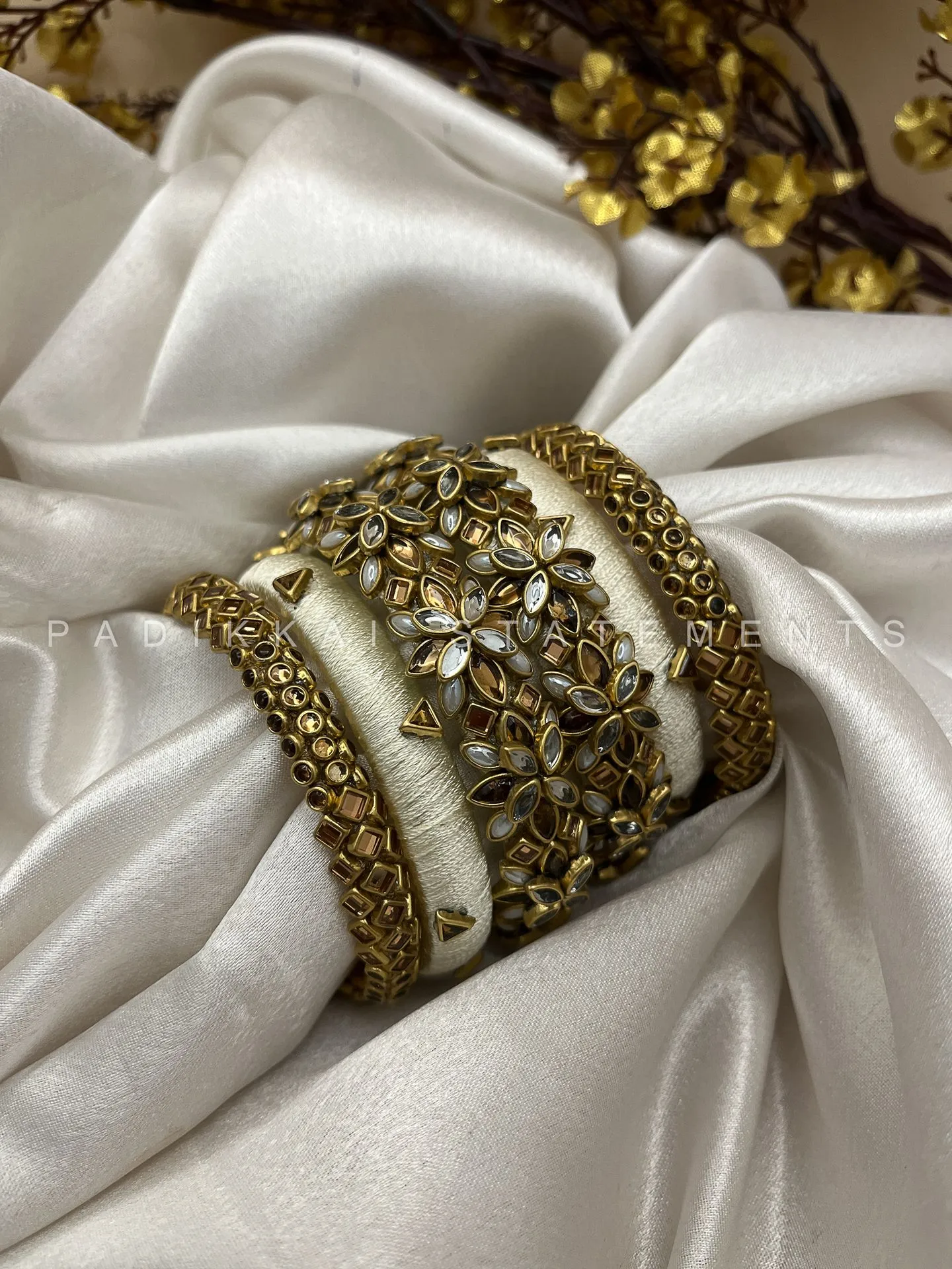 Divya Pushpa Aura Kundan Set - Ivory and Gold | Padikkai
