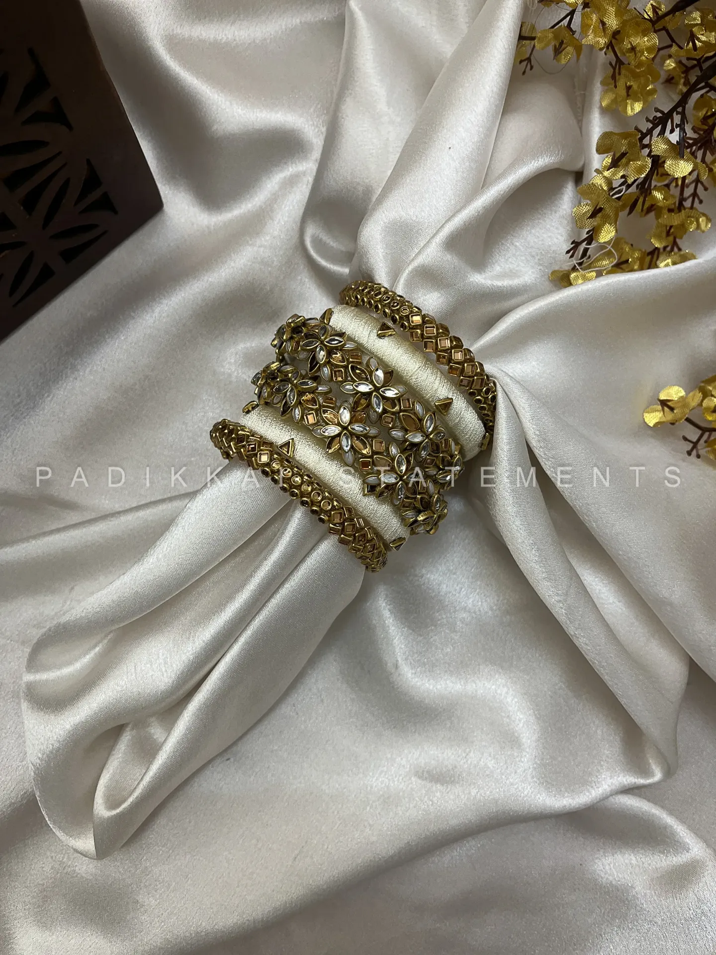 Divya Pushpa Aura Kundan Set - Ivory and Gold | Padikkai